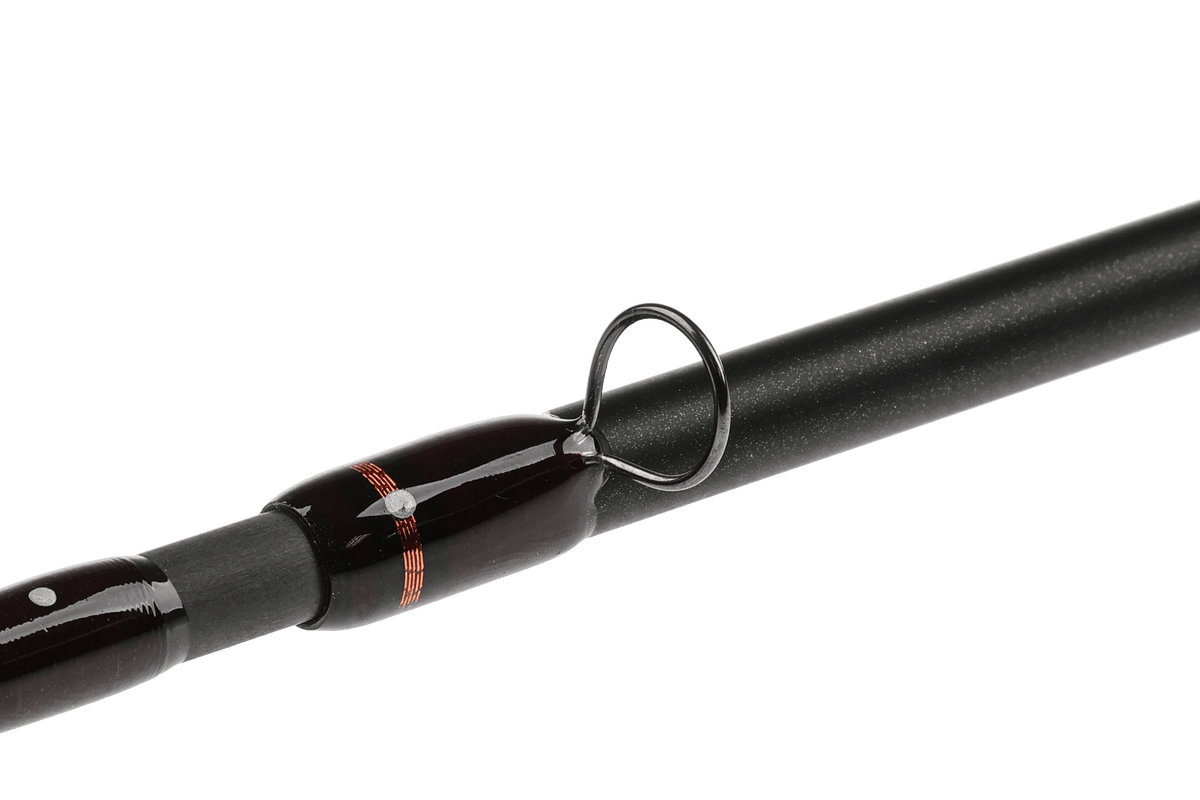 Hardy Firecrest black fly rod with chrome guide ring and dark wood handle detail against white background