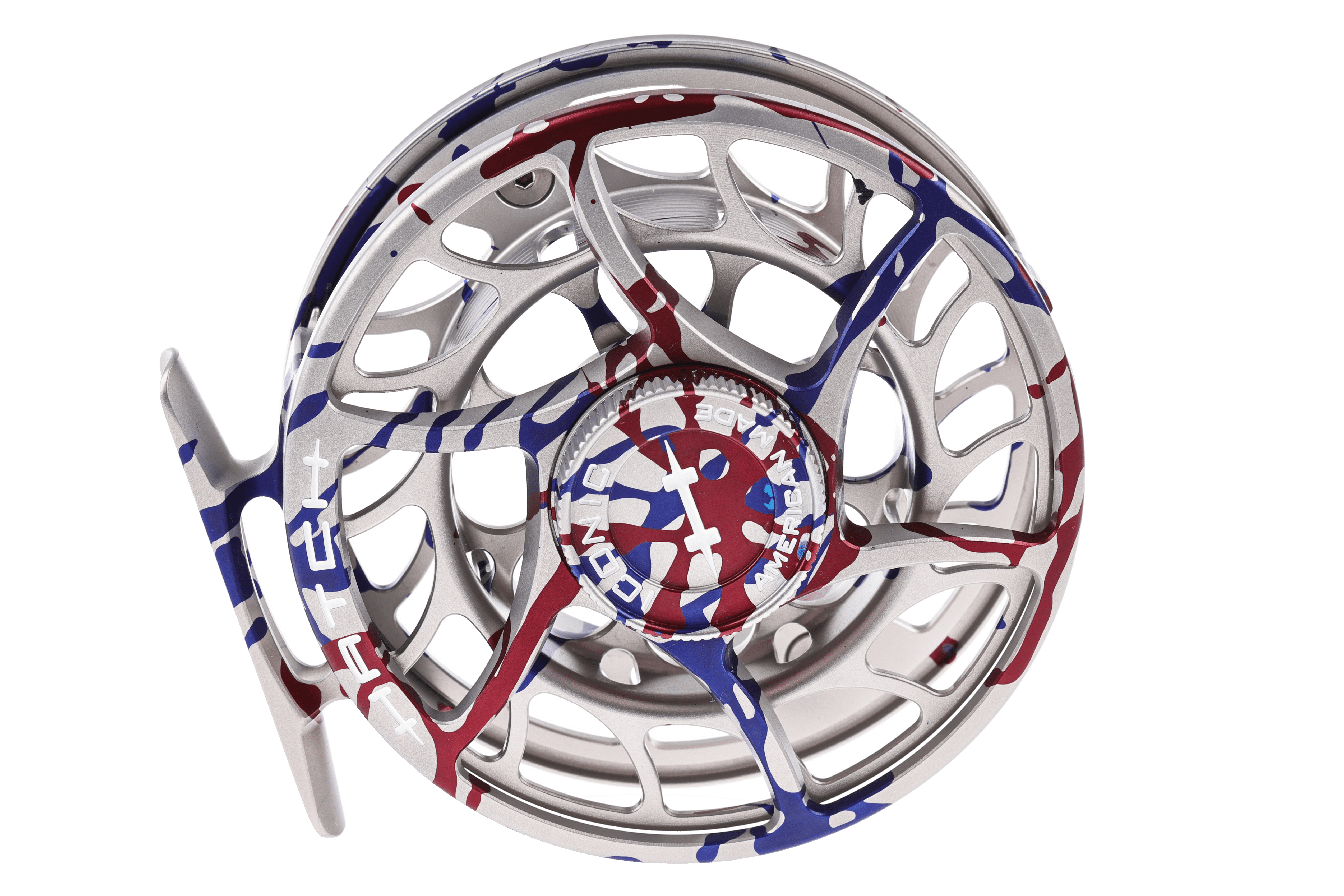 Silver machined aluminum Hatch fly reel with 250th anniversary red, white and blue splatter finish and skeletonized spool