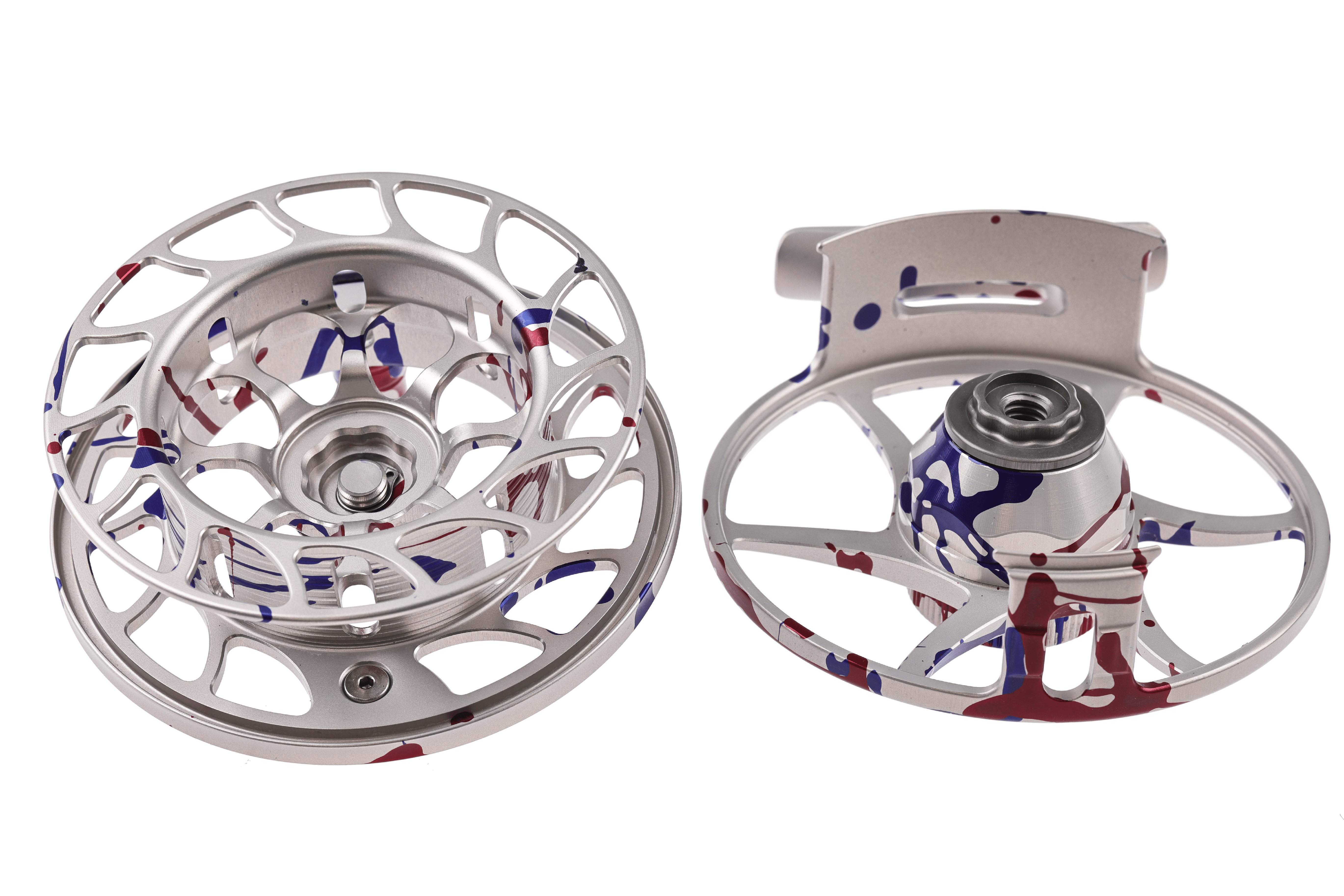 Silver machined aluminum Hatch fly reel spool with patriotic red and blue splatter paint, open-arbor skeleton design