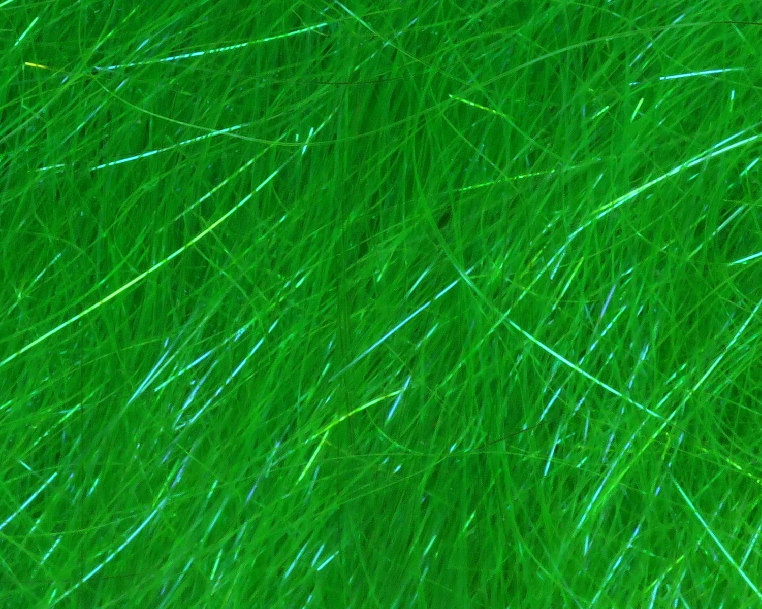 Neon green synthetic Ice Dub shimmer fringe with fine hair-like fibers and blue iridescent flash for fly tying