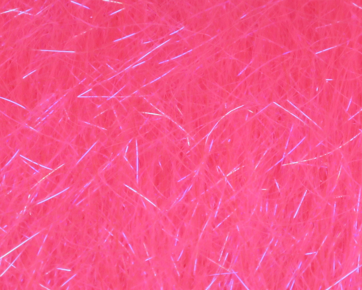 Bright pink Hareline Ice Dub shimmer fringe, synthetic dubbing fibers with iridescent flash for fly tying