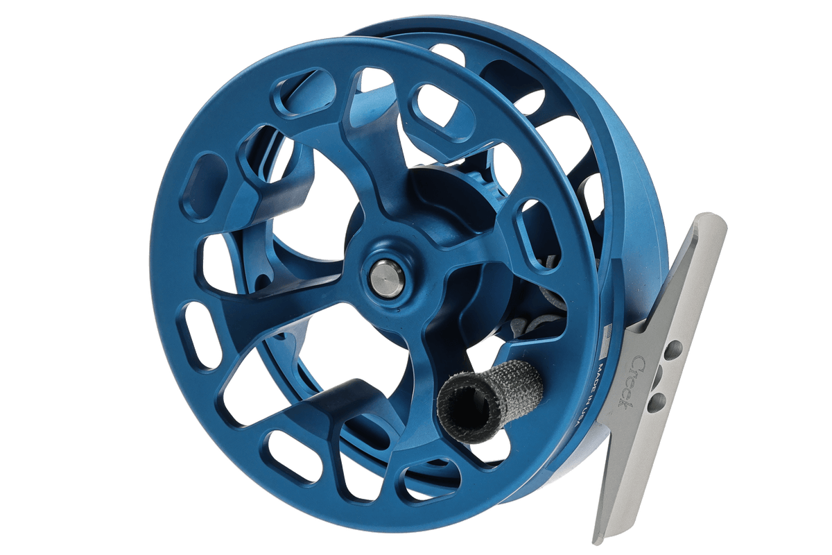 Blue Ross Cimarron Creek fly reel with perforated aluminum spool and gray handle detail