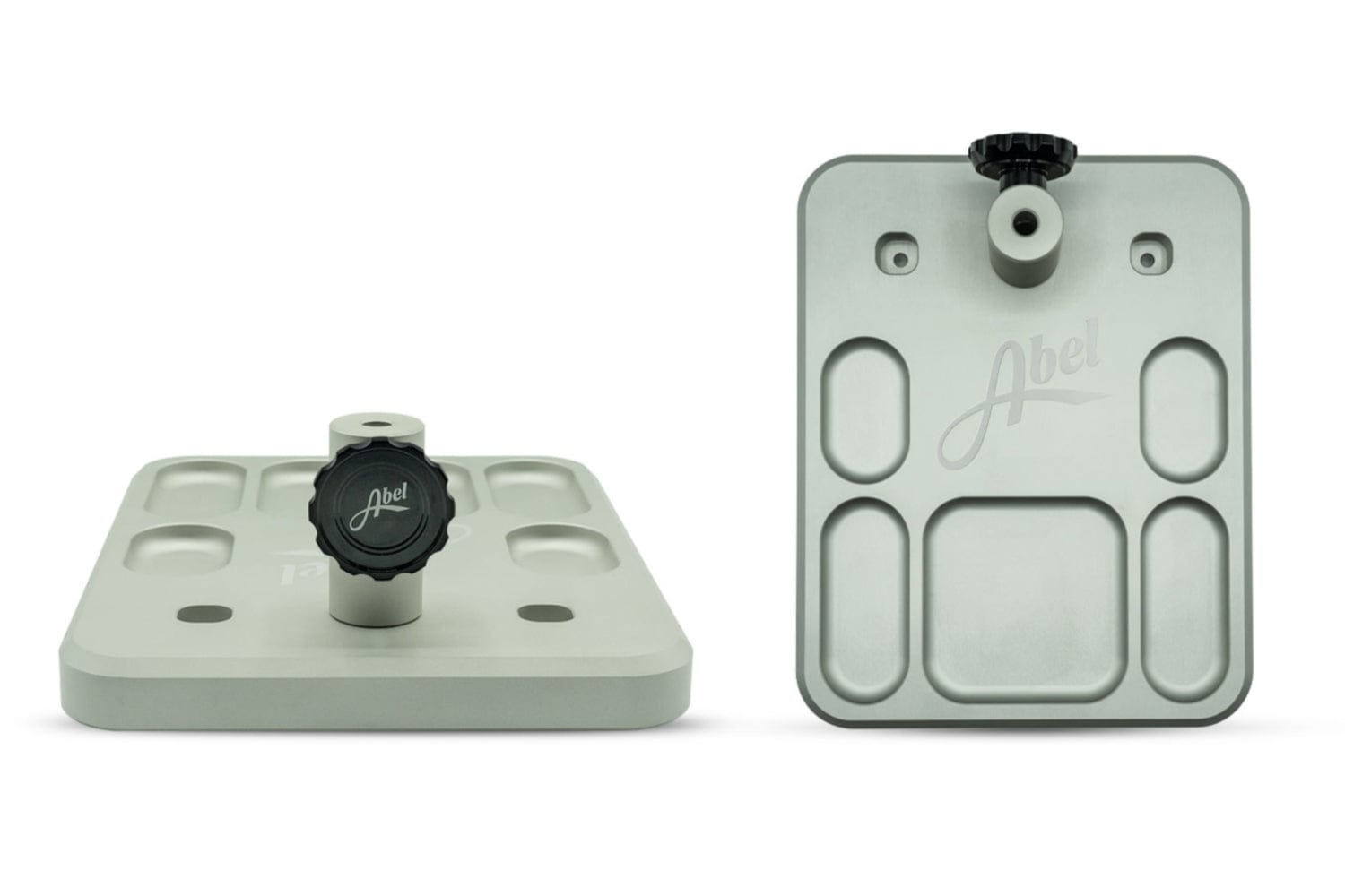 Abel vise base in matte light gray aluminum with black adjustment knob, machined rounded rectangular accessory plate
