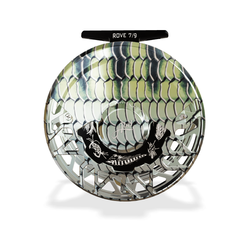 Abel ROVE 7/9 fly reel with green fish-scale anodized finish, silver machined aluminum frame and black illustrated drag plate