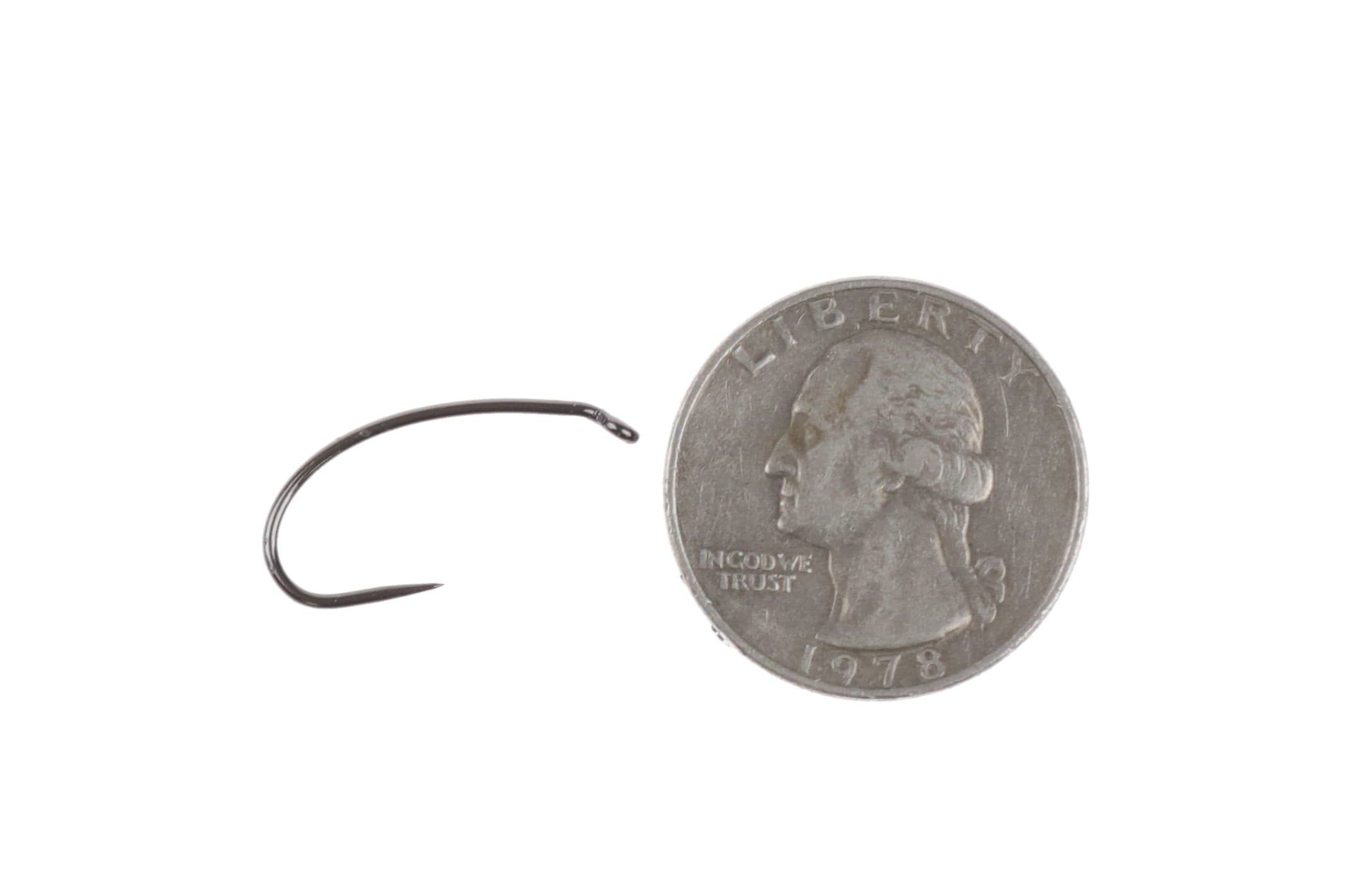 Ahrex FW541 barbless curved nymph hook black-nickel beside US quarter for scale, fine point and curved shank