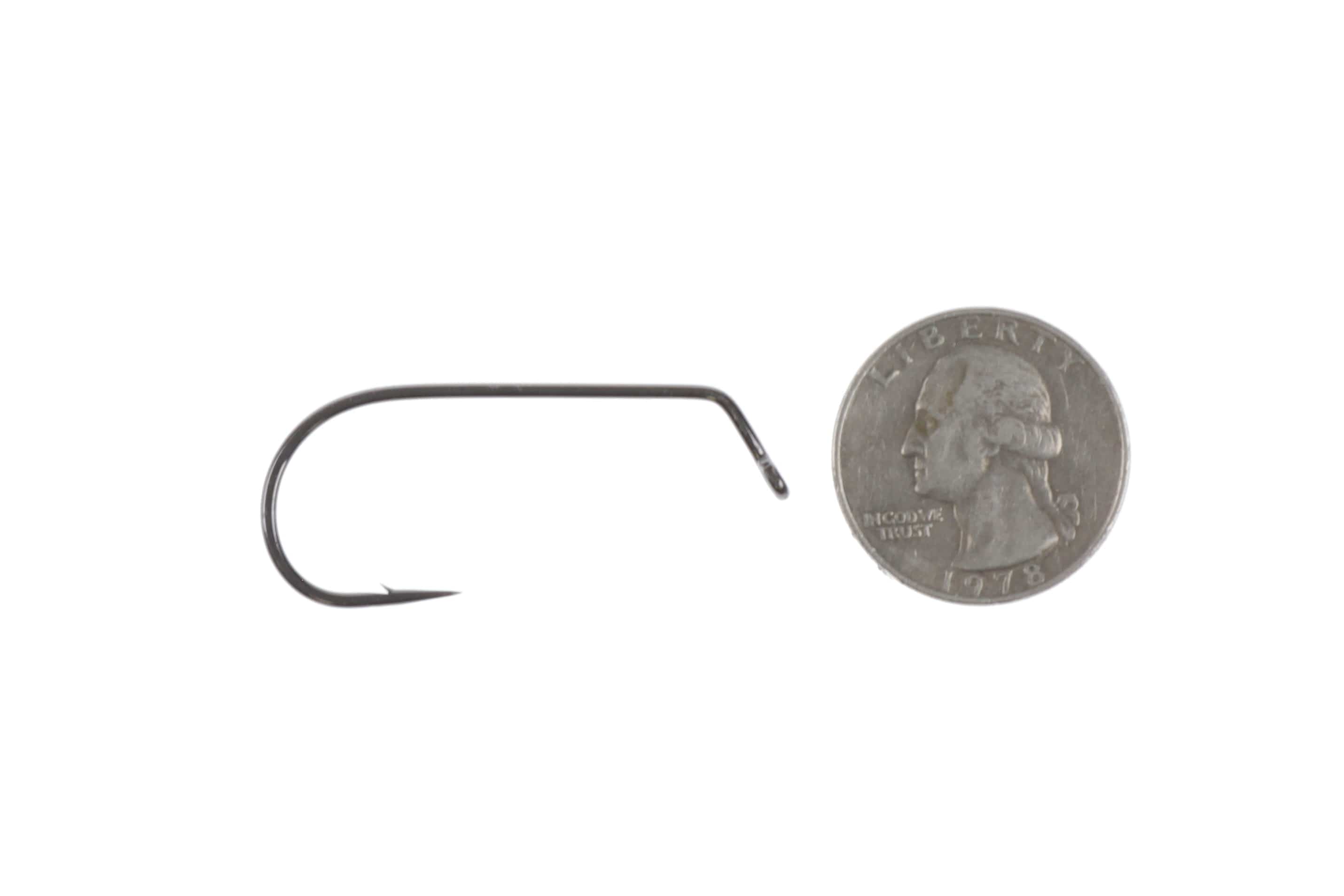 Ahrex PR370 gunmetal 60° bent streamer hook with barbed point, slim steel finish beside a quarter coin for scale