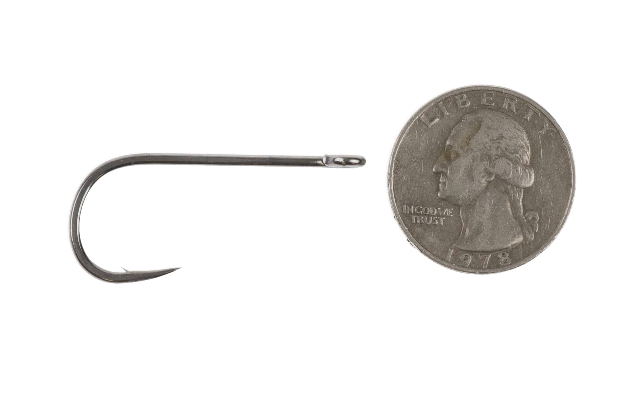 Ahrex long shank Fleye fly tying hook, black nickel finish, straight eye and curved point shown next to quarter for scale