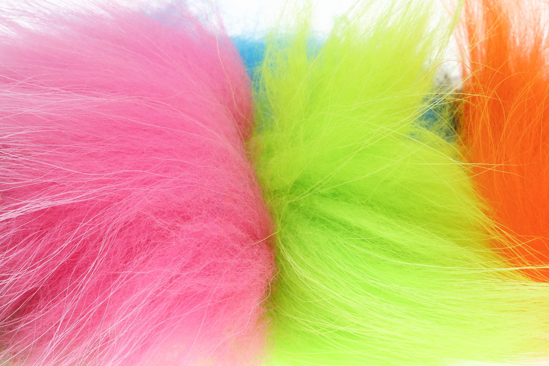 Bright pink, chartreuse and orange dyed raccoon fur blends, soft long-haired fibers for fly tying and lure crafting