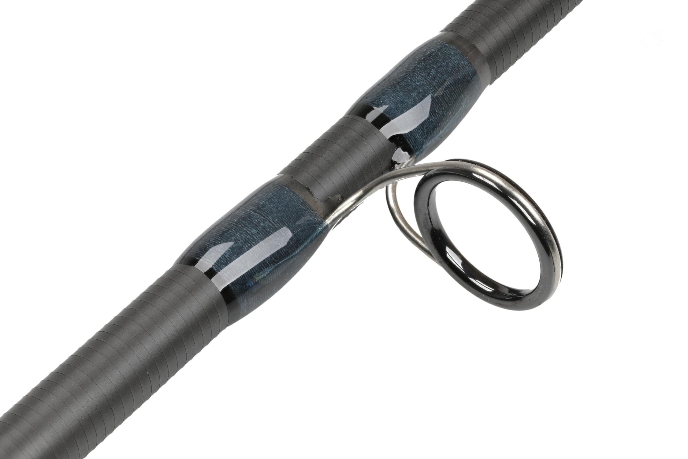 Atlas Signature 9ft 10wt fly rod showing blue carbon fiber blank, ribbed black grip wrap and polished metal guide ring