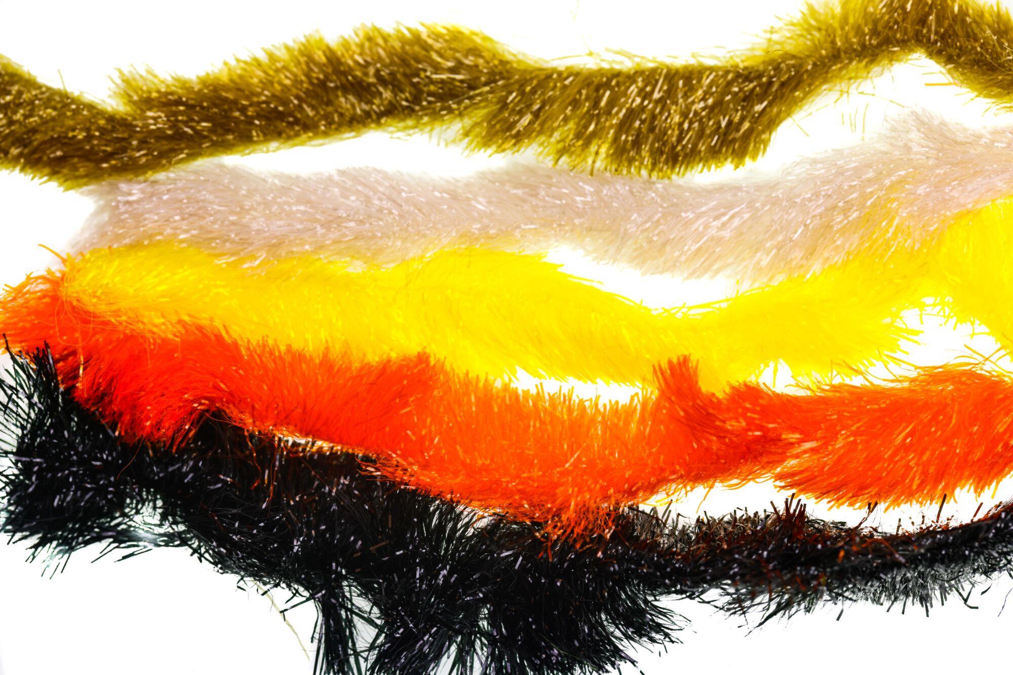 Fuzzy synthetic chenille strands in olive, white, yellow, orange and black with sparkly fibers for fly tying