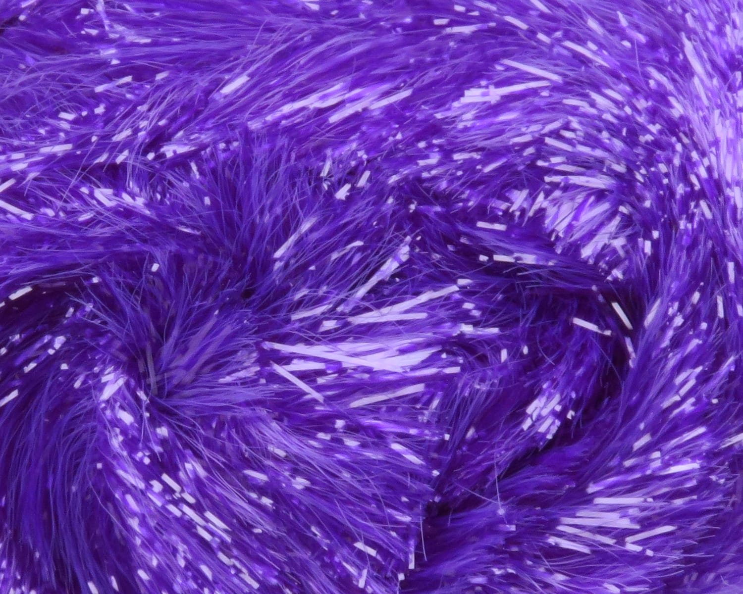 Vibrant purple Chocklett's Gamechanger chenille with fluffy fibers and reflective tinsel strands for fly tying