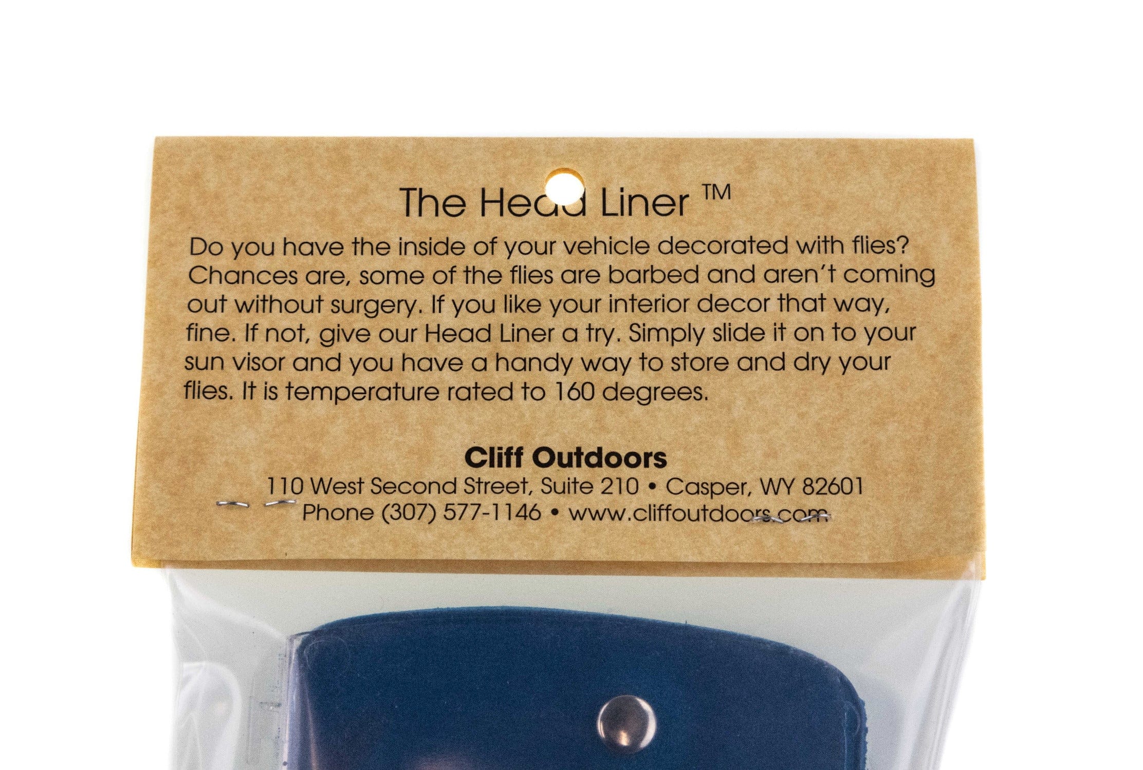 Brown kraft header with black text and navy blue fabric fly patch with metal snap in clear visor accessory packaging