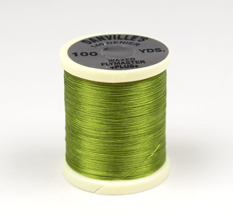Olive green Danville 140 denier waxed Flymaster thread wound on cream plastic spool, glossy fly tying thread, 100 yds