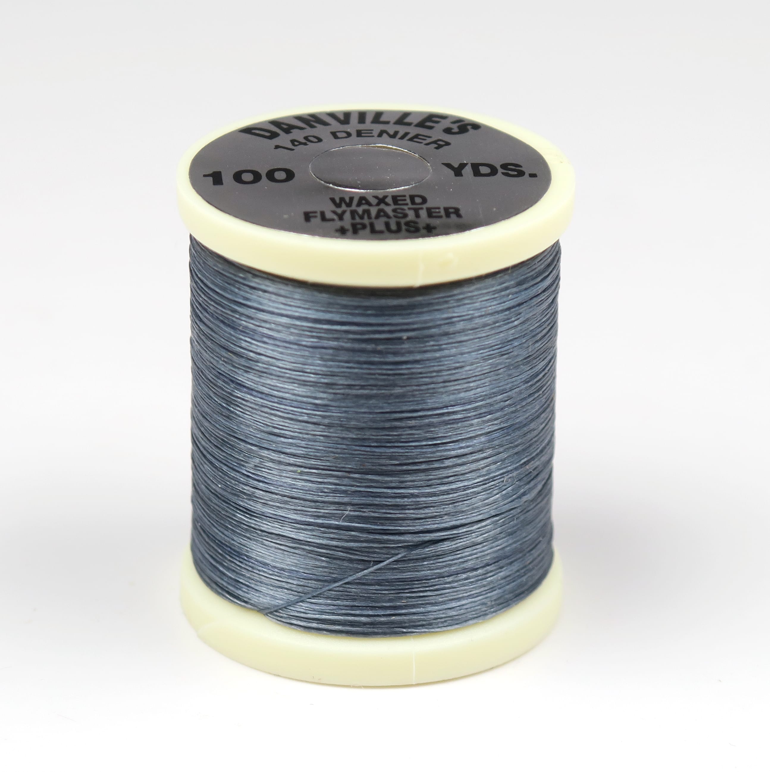 Danville waxed fly tying thread spool, slate blue 140 denier wound on cream plastic reel with black label