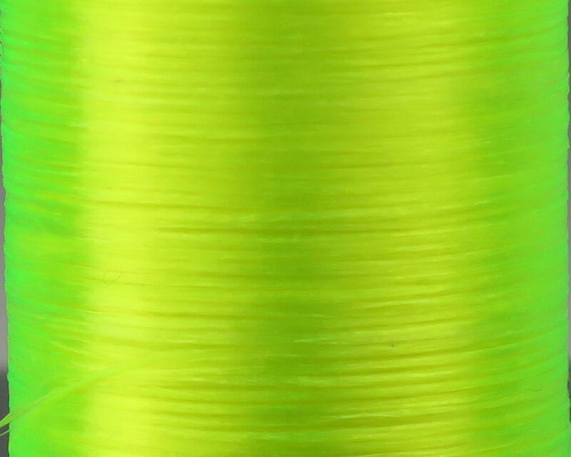 Chartreuse Danville flat waxed thread spool, glossy 210 denier synthetic, tightly wound for fly tying