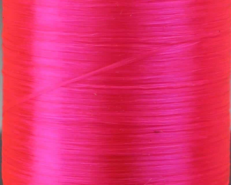 Bright hot pink Danville 210 denier flat waxed thread spool with glossy, flat synthetic fibers