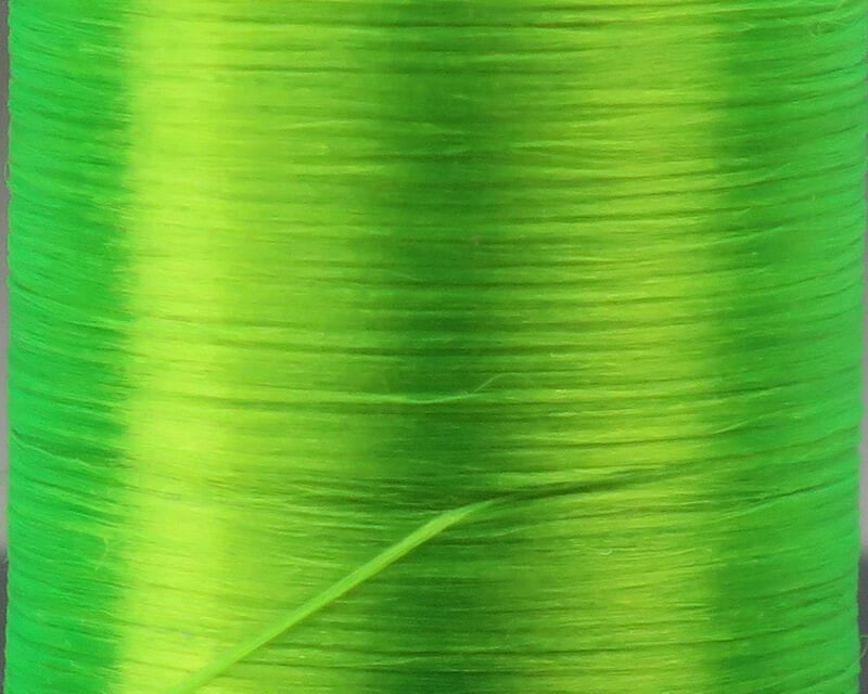 Bright chartreuse Danville 210 denier flat waxed thread spool close-up, smooth waxed nylon for fly tying