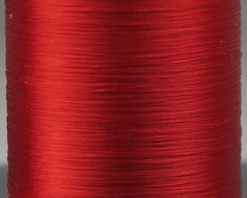Vibrant glossy red Danville Flymaster 6/0 fly-tying thread spool, smooth fine synthetic 70 denier strands