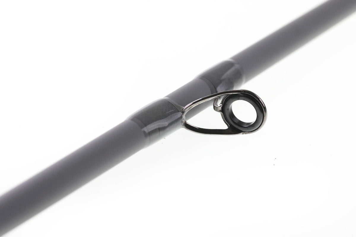 Douglas ERA fly rod close-up of charcoal graphite blank with glossy weave and black metal guide ring