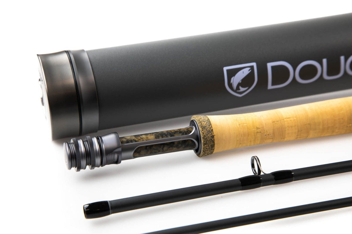 Douglas SKY-G fly rod showing cork handle, matte black carbon blank, metal reel seat and black protective rod tube