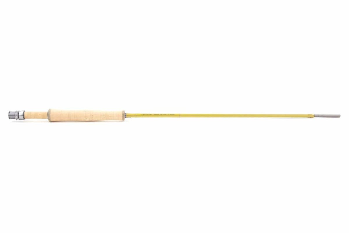 Douglas Upstream Plus yellow graphite fly rod with natural cork handle and silver reel seat, slim lightweight design