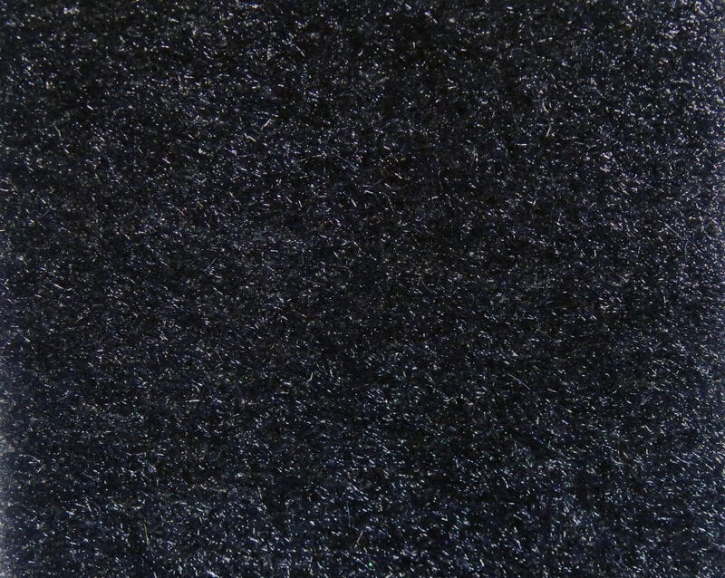 Black thin furry foam sheet with adhesive backing, velvet-like texture and subtle iridescent fibers for fly tying