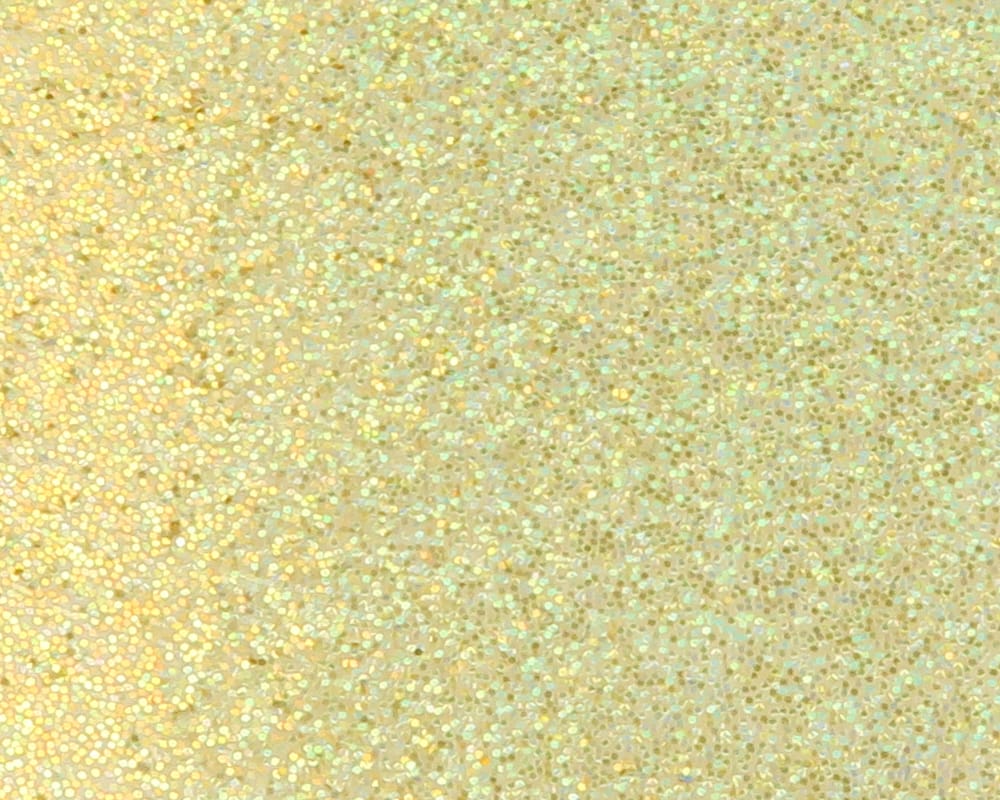 Pale gold iridescent Crystal Skin film with microscopic hex shimmer, glossy fly-tying material for creating sparkling flies