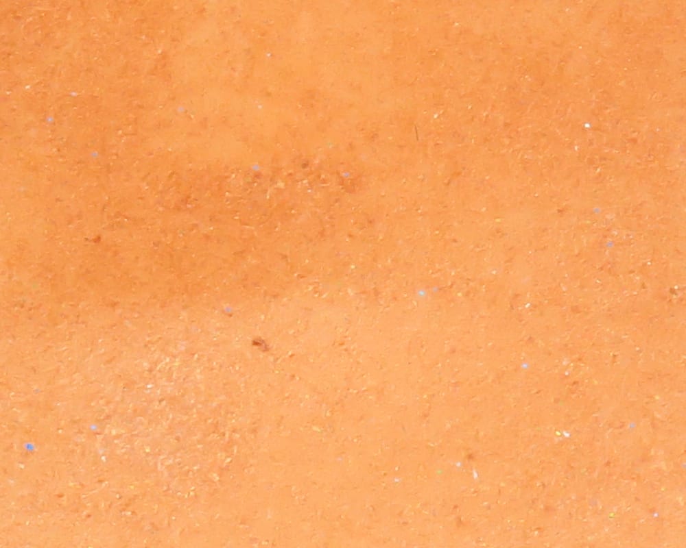 Orange D's Flyes Crystal Skin sheet — textured synthetic fly tying material with subtle iridescent micro-fleck sparkle