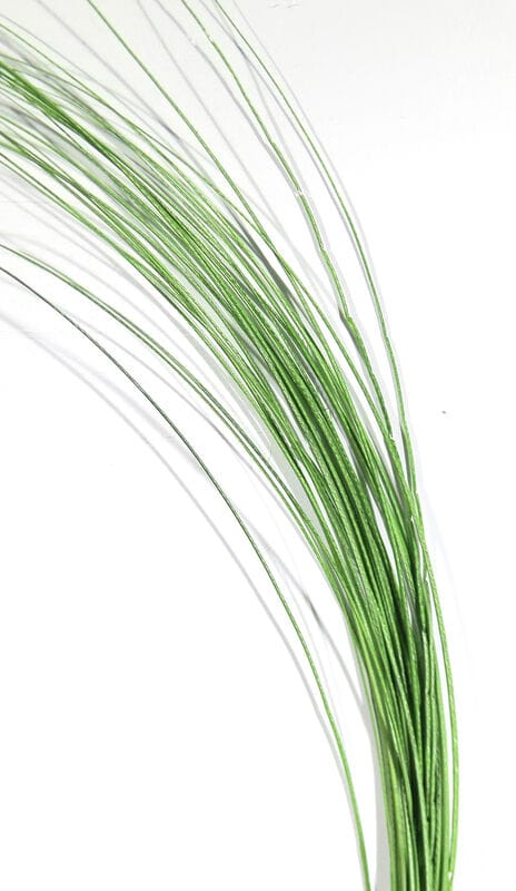 Green metallic quill body strands from Ds Flyes—thin glossy, iridescent fibers for fly tying