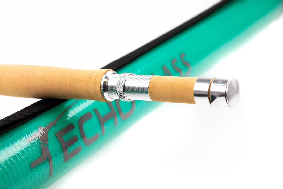 Cork-handled Echo River glass fly rod section with silver knurled reel seat and turquoise rod tube sleeve