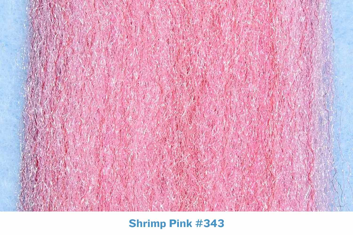 Shrimp pink Enrico Puglisi 3D Silky Fibers close-up, soft shimmering pale-pink synthetic strands for fly tying