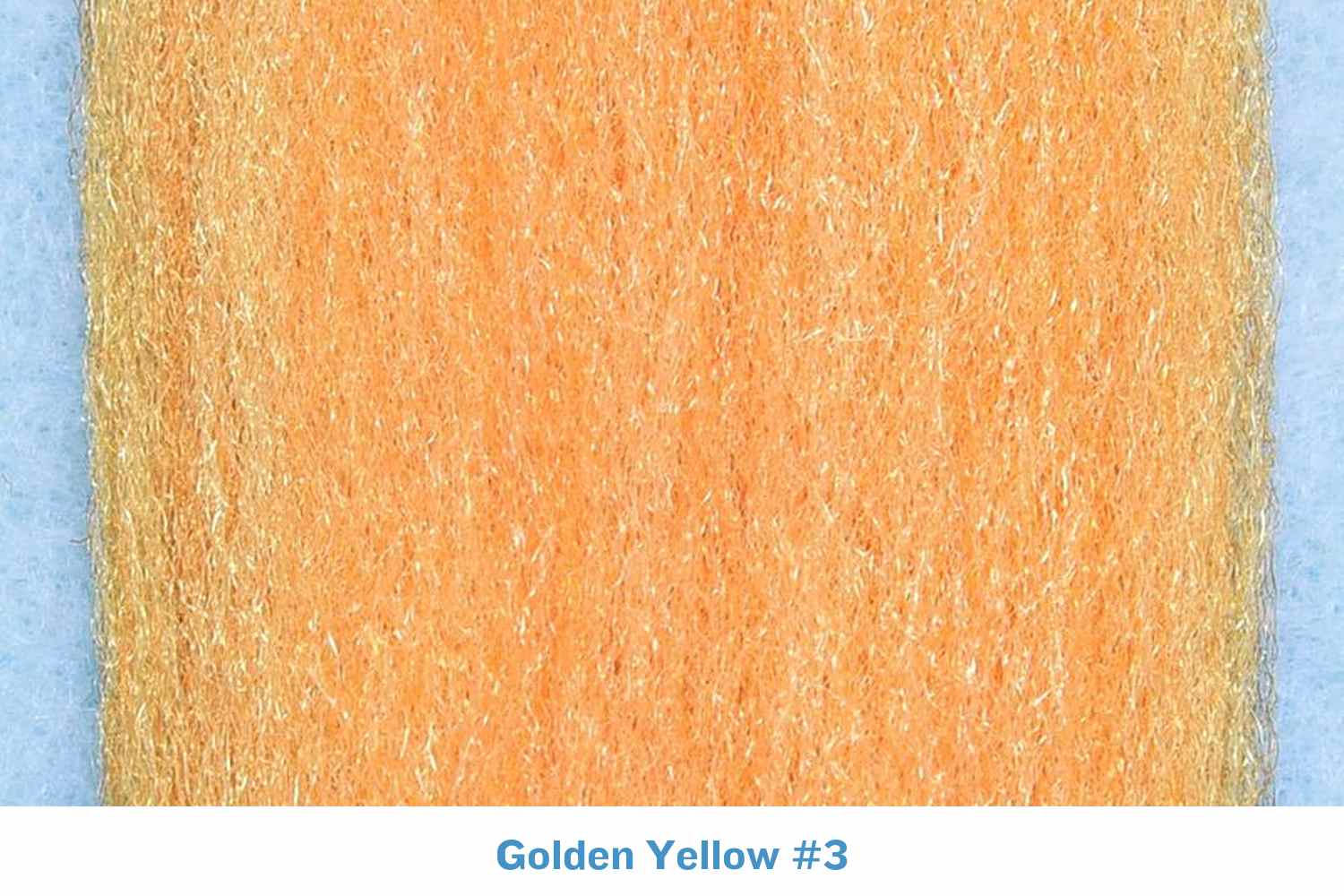 Golden yellow silky fly tying fibers with fine iridescent strands and soft brushed texture