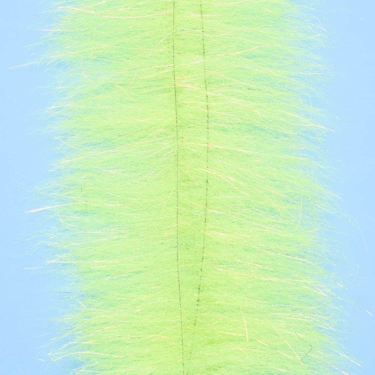 Chartreuse Anadromus brush with dense synthetic fur, iridescent flash fibers and center stitching for fly tying