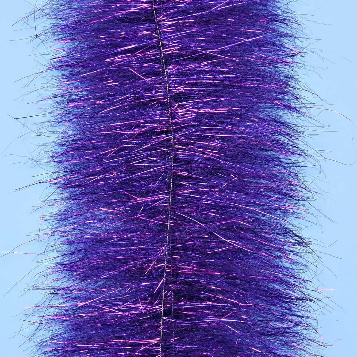 Purple iridescent synthetic Anadromus brush with dense long shimmering fibers for fly tying