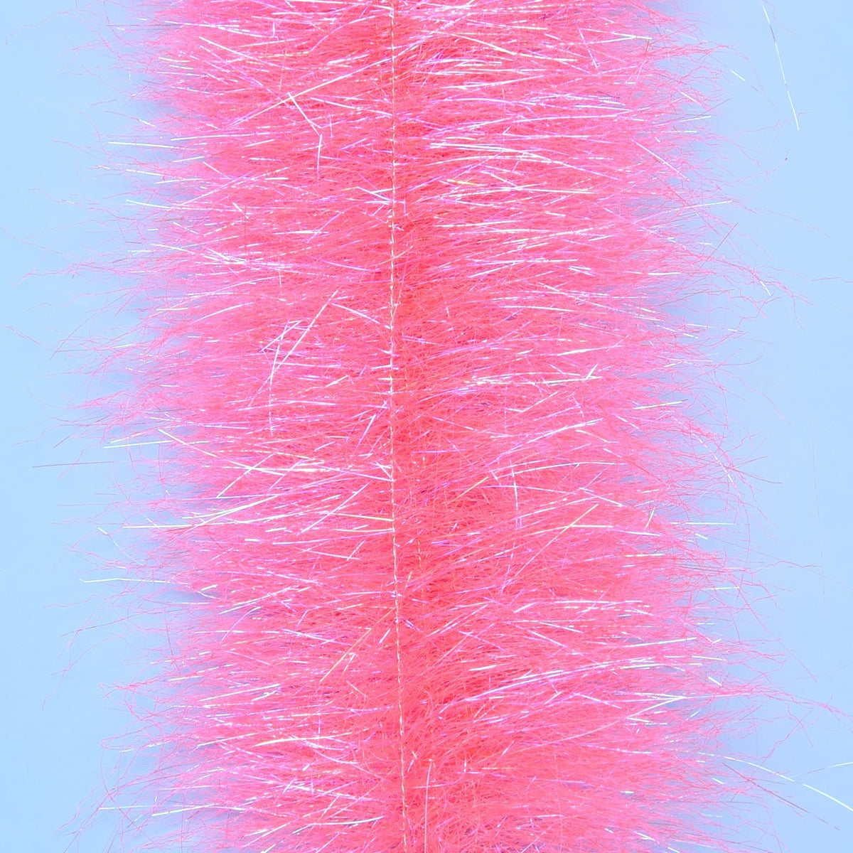 Bright pink Enrico Puglisi Anadromus brush with fuzzy synthetic fibers and iridescent tinsel strands for fly tying