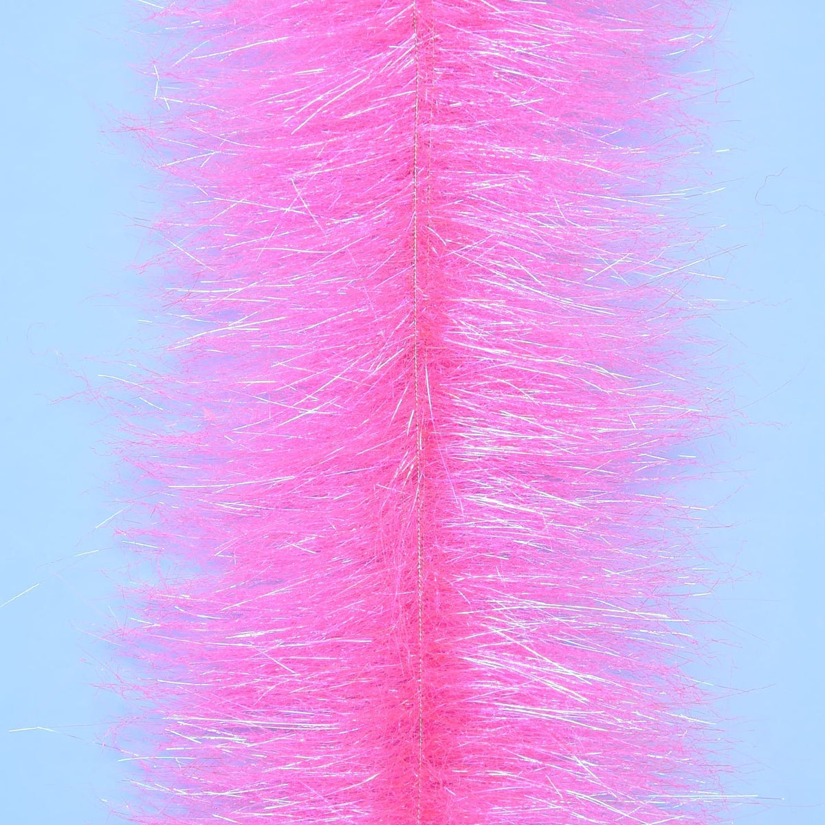 Neon pink Enrico Puglisi Anadromus fly tying brush with fluffy synthetic fibers and silver iridescent strands