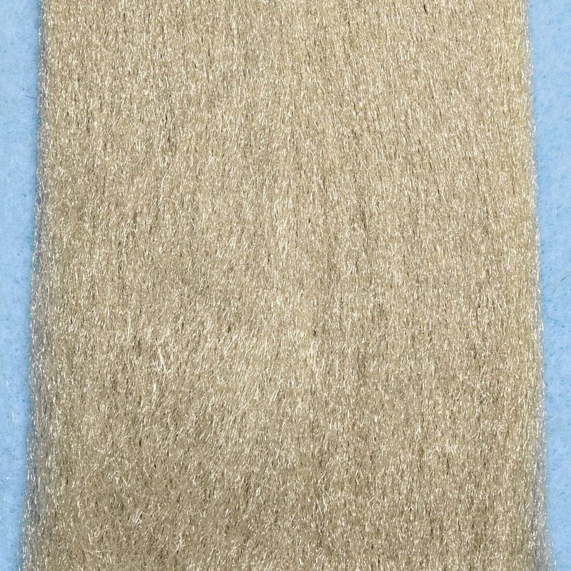Tan synthetic EP Fibers with subtle shimmer on blue backing, dense brushed texture for fly tying