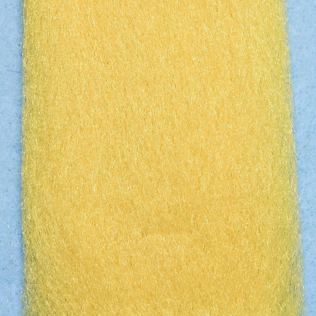 Pale yellow EP Fibers synthetic sheet with fine shimmering strands for fly tying