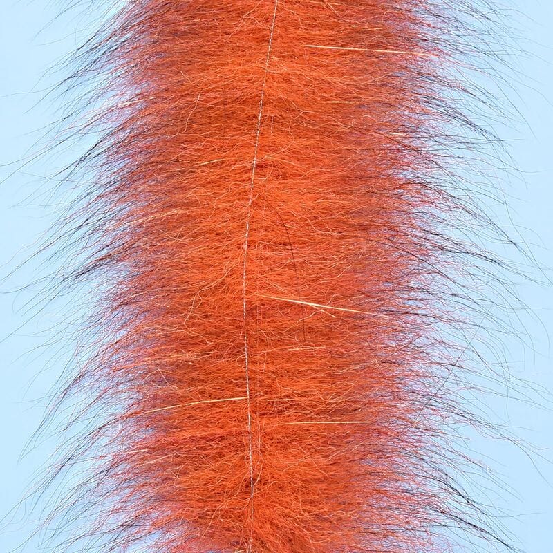 Vibrant orange fox fur strip with long wispy guard hairs and dense underfur for fly tying, Enrico Puglisi Foxy Brush