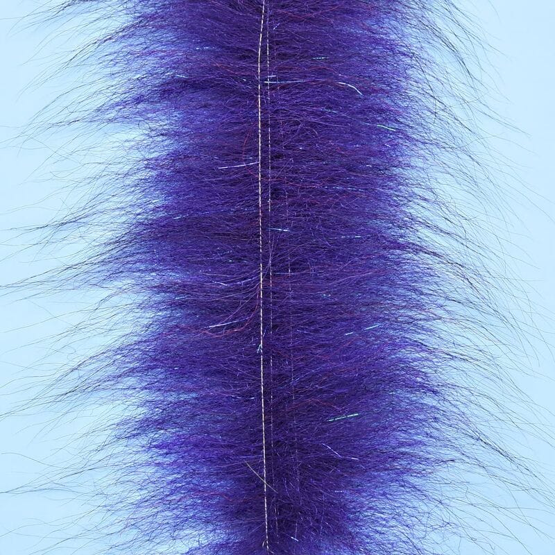 Purple Enrico Puglisi Foxy Brush with long wispy synthetic fur and iridescent tinsel fibers for fly tying