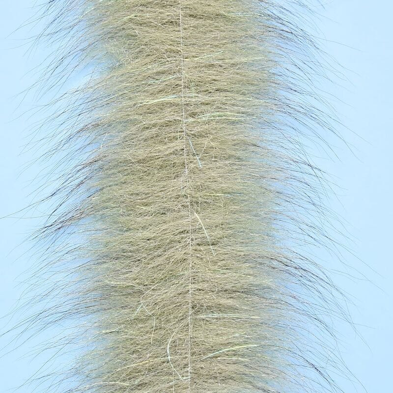 Tan-beige synthetic Foxy Brush with long wispy fibers and subtle iridescent flash for fly tying