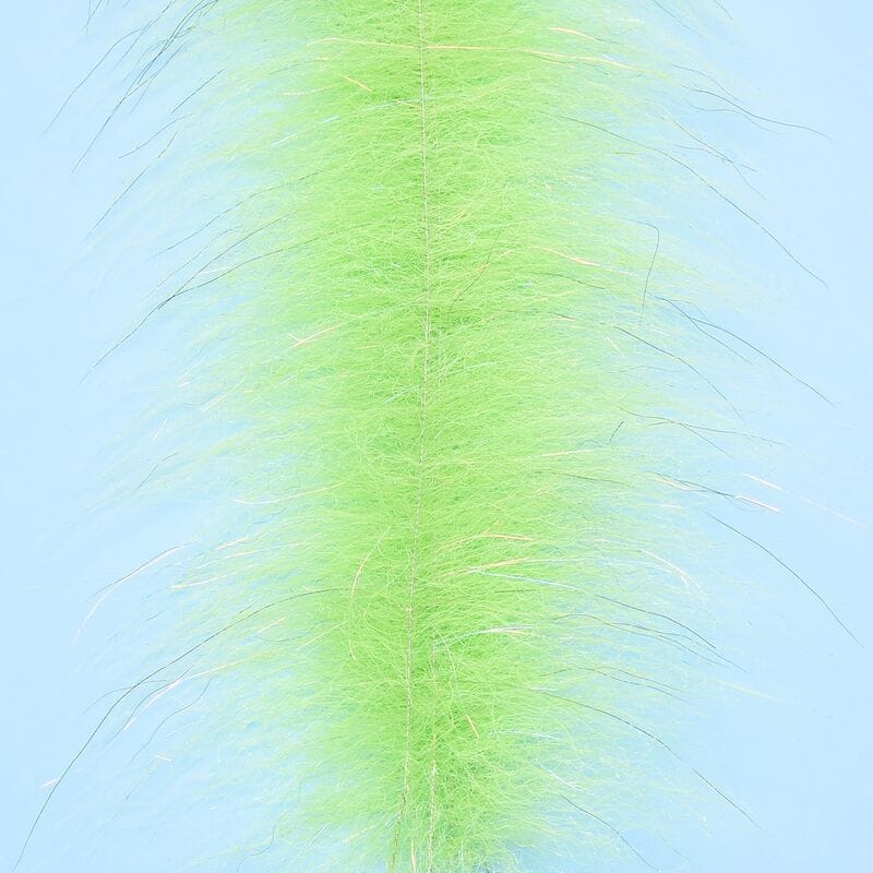 Chartreuse Enrico Puglisi Foxy Brush with long synthetic hair and subtle silver flash fibers for fly tying