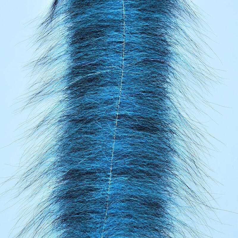 Bright blue and black dyed fox fur strip with long wispy fibers and central stitched spine, Foxy Brush for fly tying