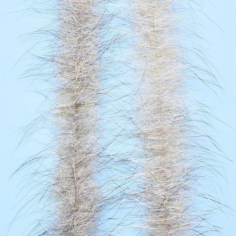 Enrico Puglisi Foxy Brush: two long pale tan-gray fox fur strips with wispy guard hairs and subtle silver flash for fly tying