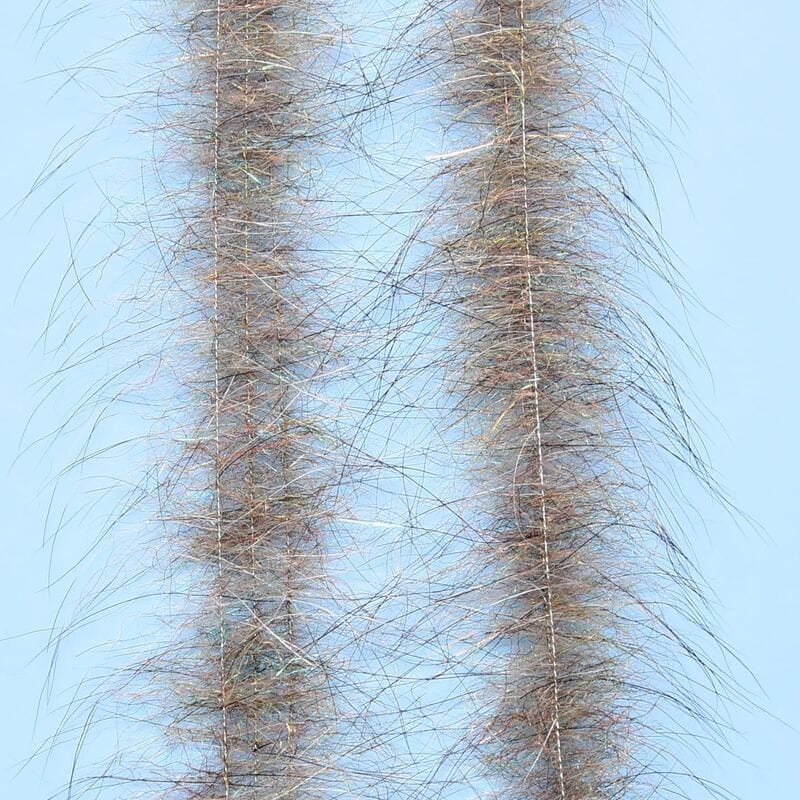 Enrico Puglisi Foxy Brush fly tying two tan-brown fur strips with wispy guard hairs and iridescent fibers