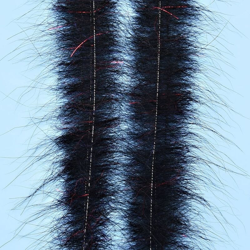 Black Enrico Puglisi Foxy Brush fly tying material: two fuzzy synthetic fur strips with subtle red flash and stitched center