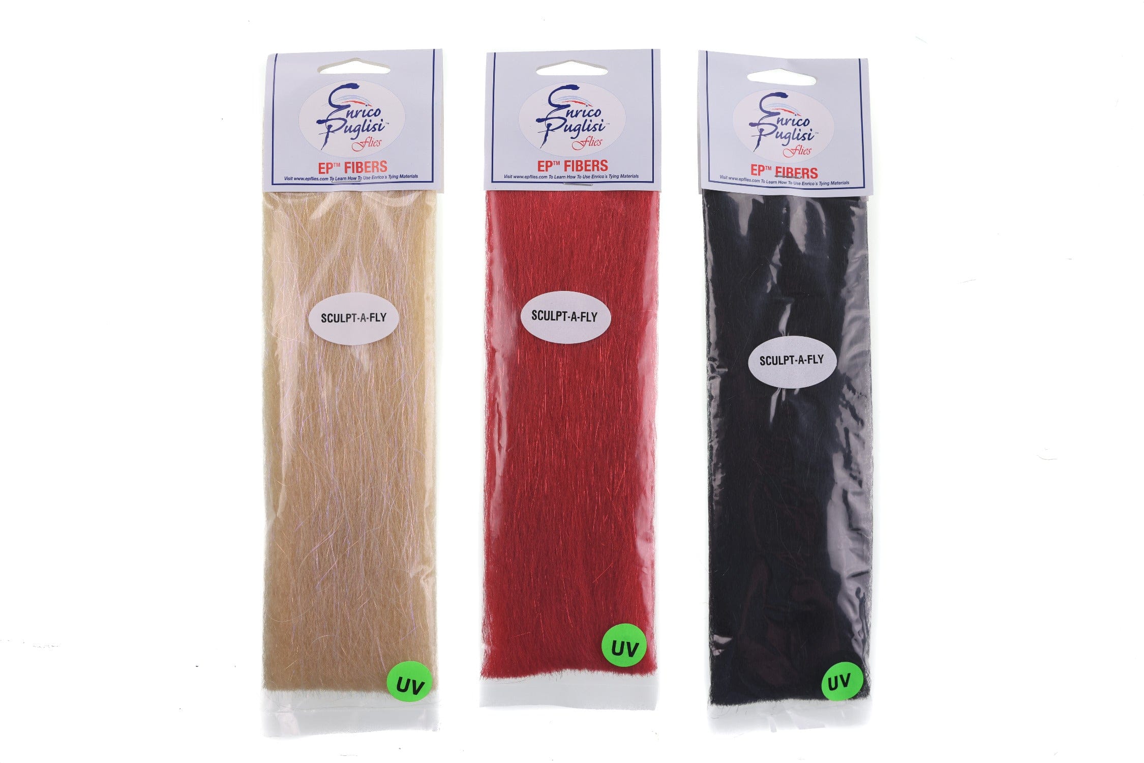 Three Enrico Puglisi Sculpt-A-Fly fly tying fibers in tan, red and black; long synthetic strands in clear packages