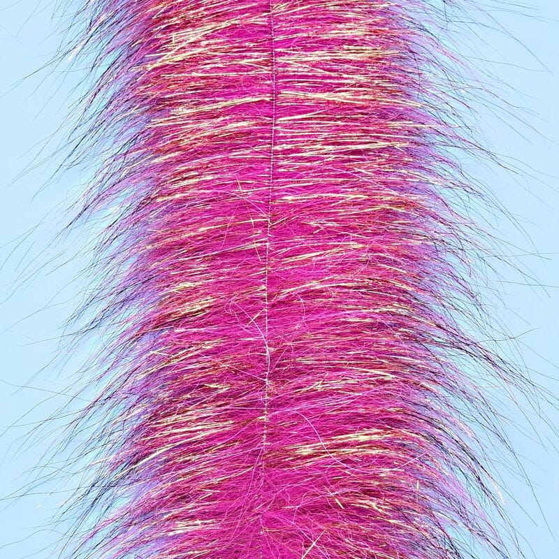 Magenta Senyo Chromatic brush with gold flash fibers and long synthetic fur on a stitched central spine for fly tying
