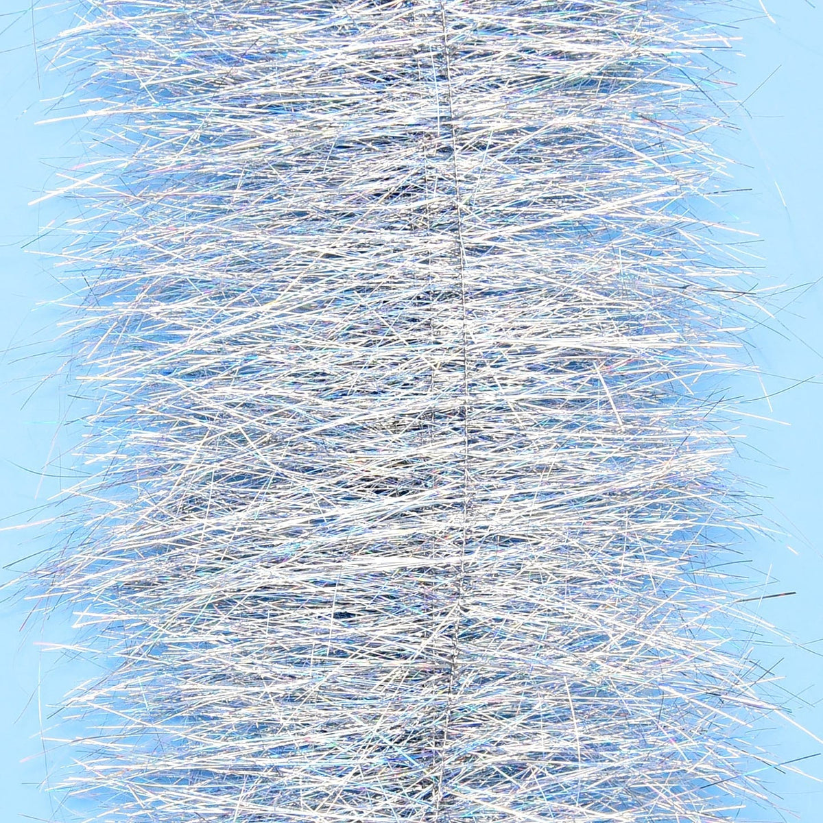 Enrico Puglisi Sparkle Brush silver iridescent tinsel bristles on blue background, fly tying material