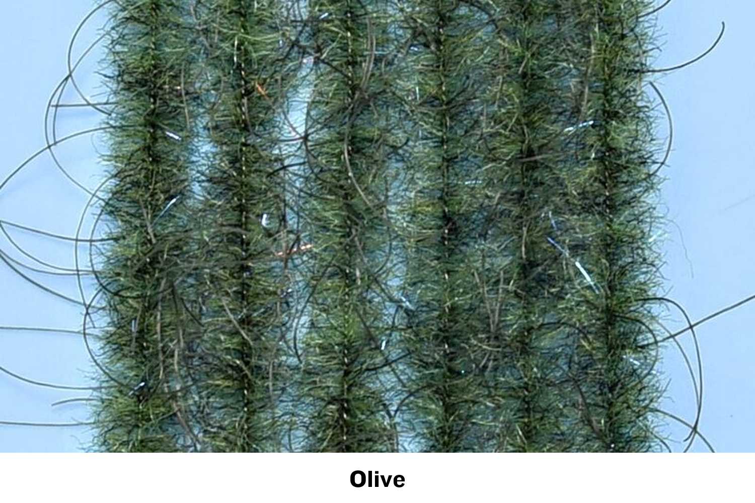 Olive Enrico Puglisi Woolly Critter Brush strands — dense fuzzy fiber with wispy hair and silver flash for fly tying